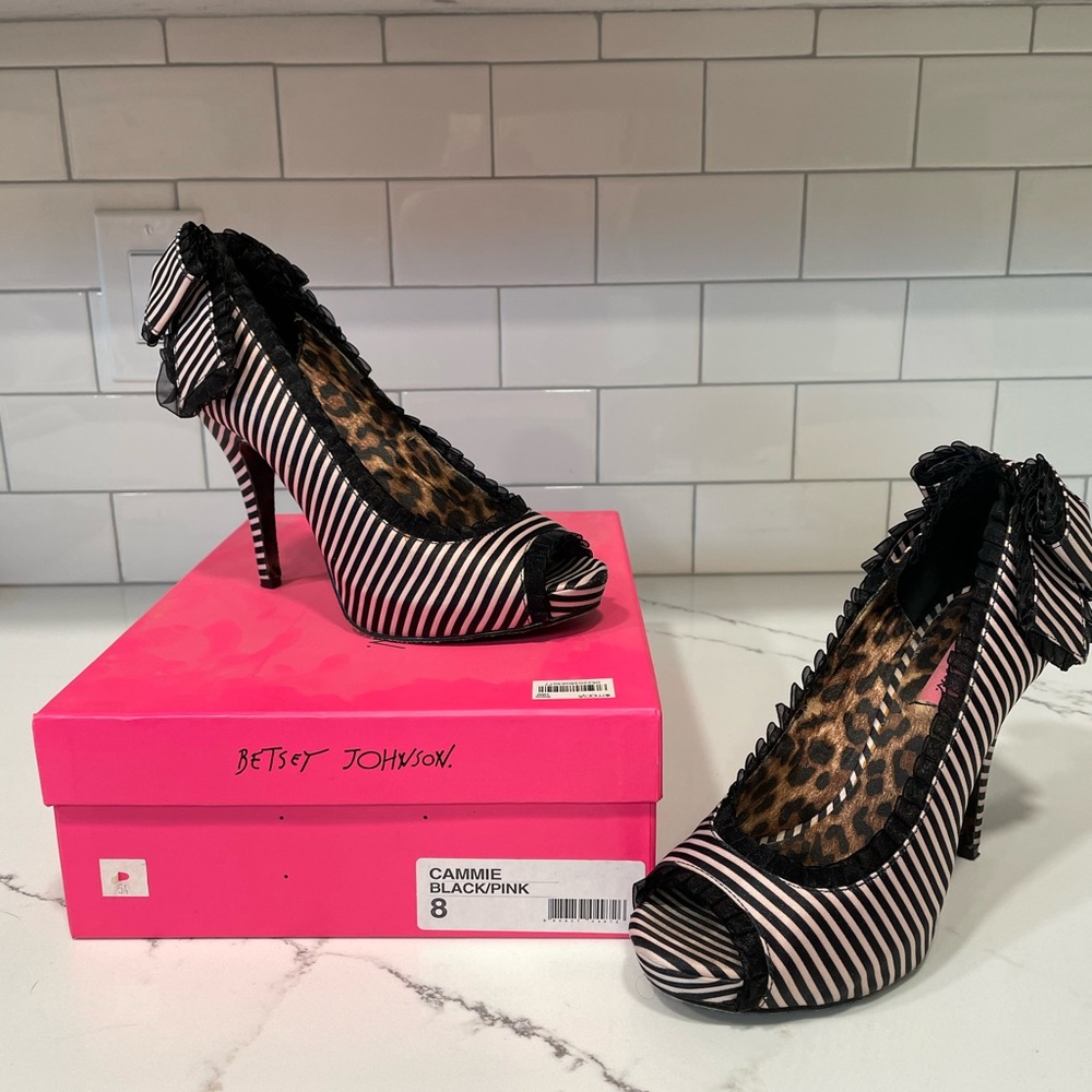 Betsey Johnson Cammie Black and pink with a bow in the back.